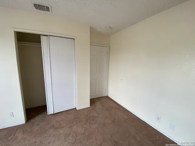 an empty room with closet