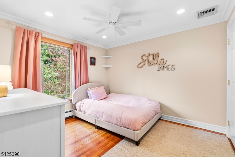 21 Turkey Hill Road Montville, NJ 07005 - Photo 15 of 32 a bedroom with a bed and a window