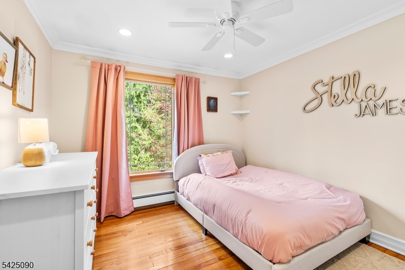 21 Turkey Hill Road Montville, NJ 07005 - Photo 16 of 32 a bedroom with a bed and a window