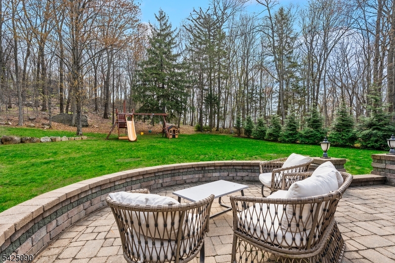 21 Turkey Hill Road Montville, NJ 07005 - Photo 31 of 32 a view of an outdoor sitting area with furniture and garden
