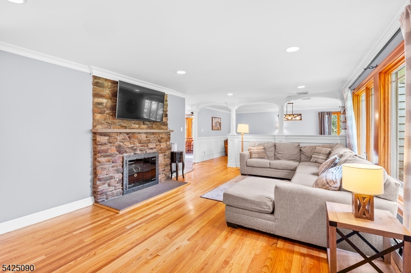 21 Turkey Hill Road Montville, NJ 07005 - Photo 4 of 32 a living room with furniture fireplace and flat screen tv