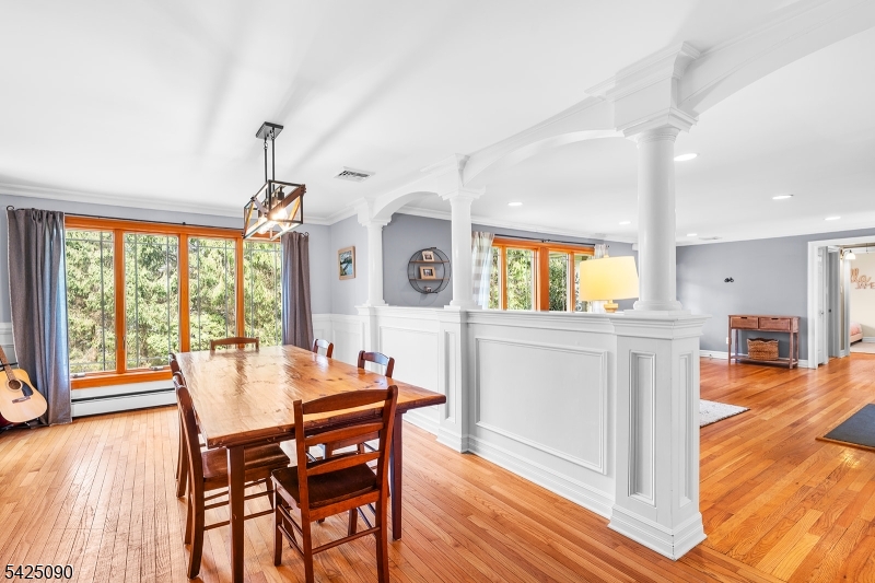 21 Turkey Hill Road Montville, NJ 07005 - Photo 8 of 32 a view of a dining room with furniture window and wooden floor