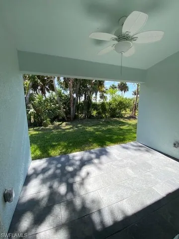 a view of a terrace with a yard