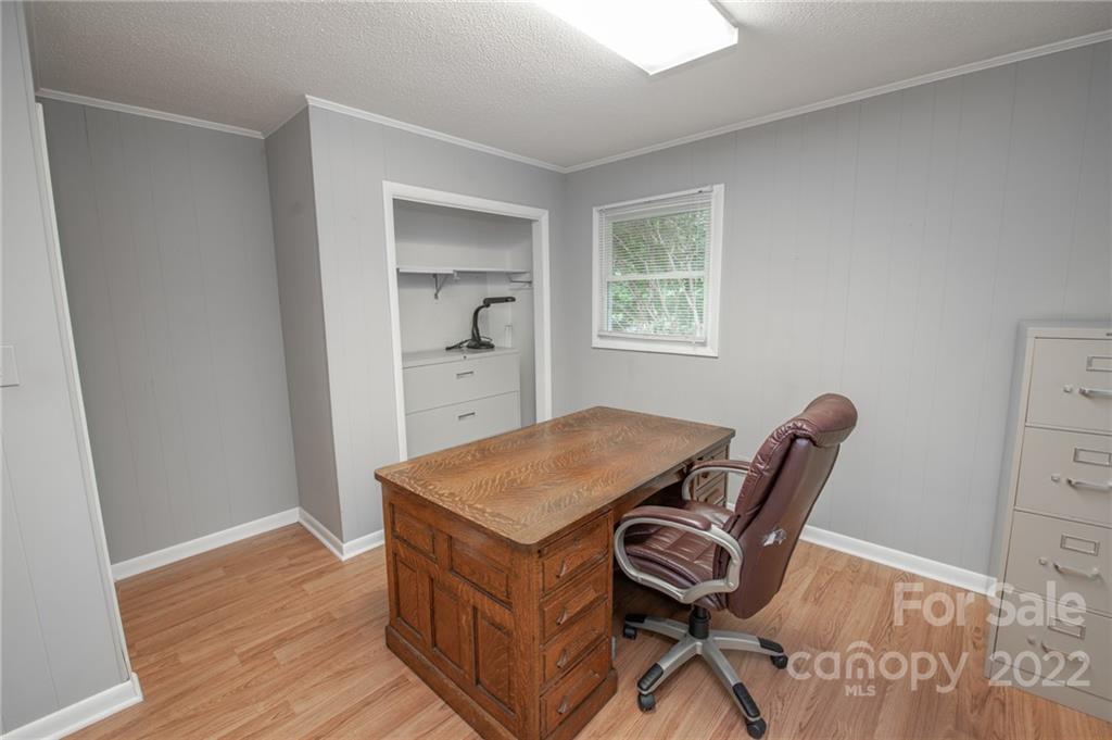 3255 Lake Shore Road South Denver, NC 28037 - Photo 23 of 32 a view of a workspace with furniture and wooden floor