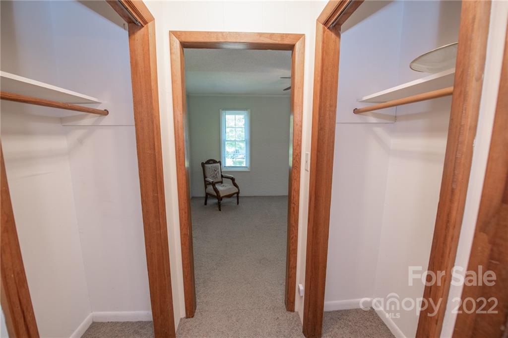3255 Lake Shore Road South Denver, NC 28037 - Photo 26 of 32 a view of a hallway with a livingroom and couch