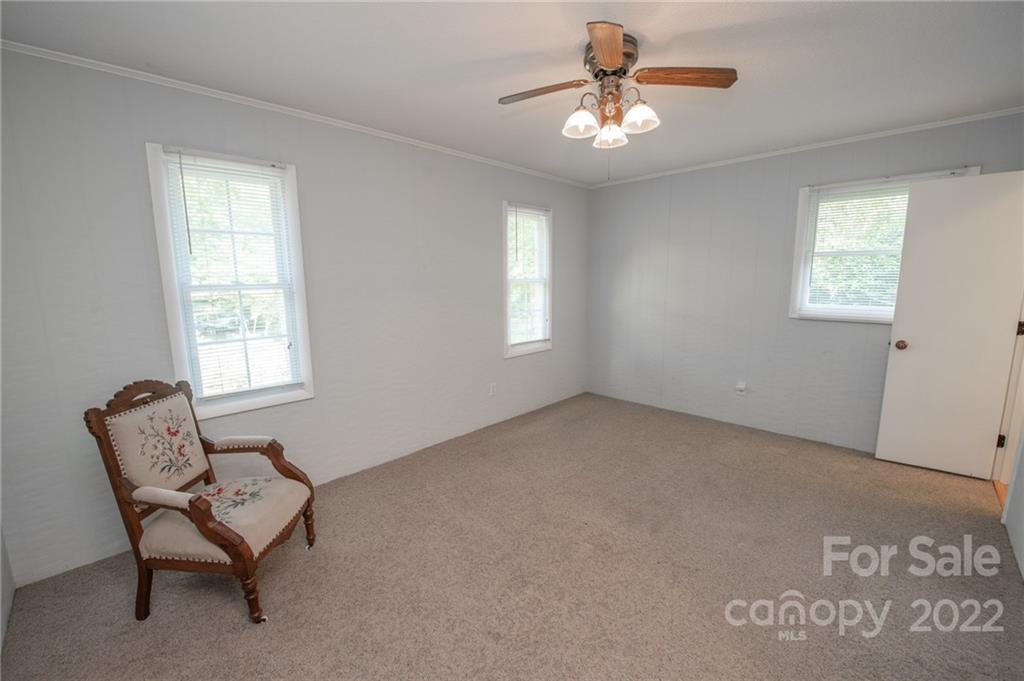 3255 Lake Shore Road South Denver, NC 28037 - Photo 27 of 32 a view of a livingroom with furniture and windows