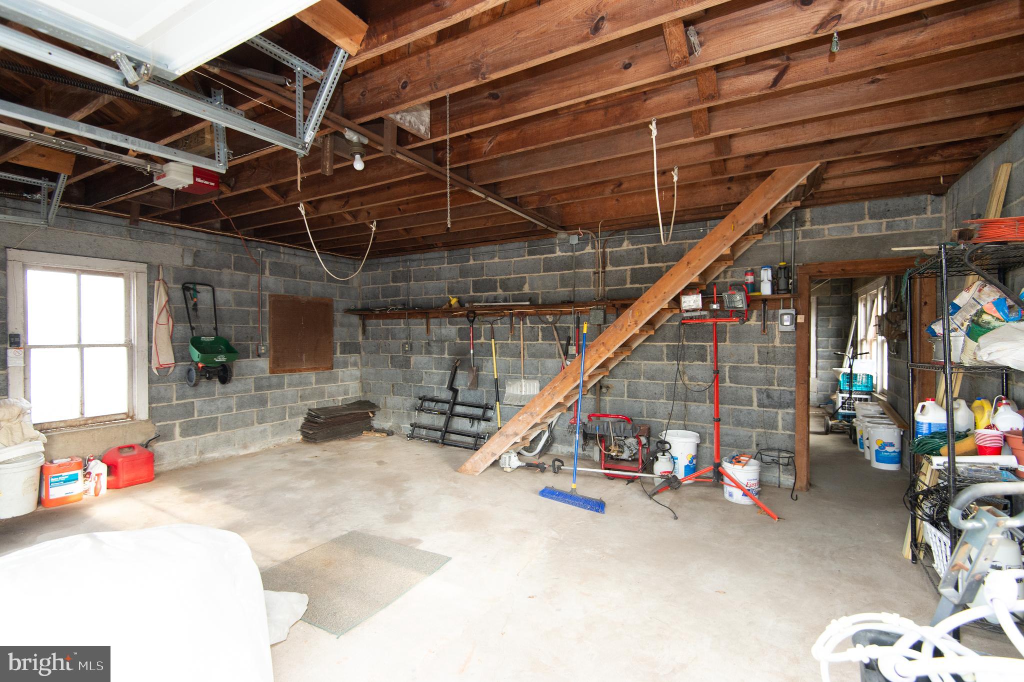 114 Riverside Drive Cambridge, MD 21613 - Photo 28 of 43 Workshop -Stairs to Large Floored Attic
