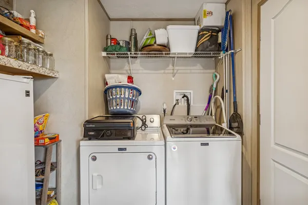 a view of storage and utility room