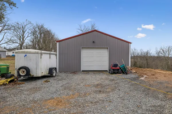 a view of a house with backyard