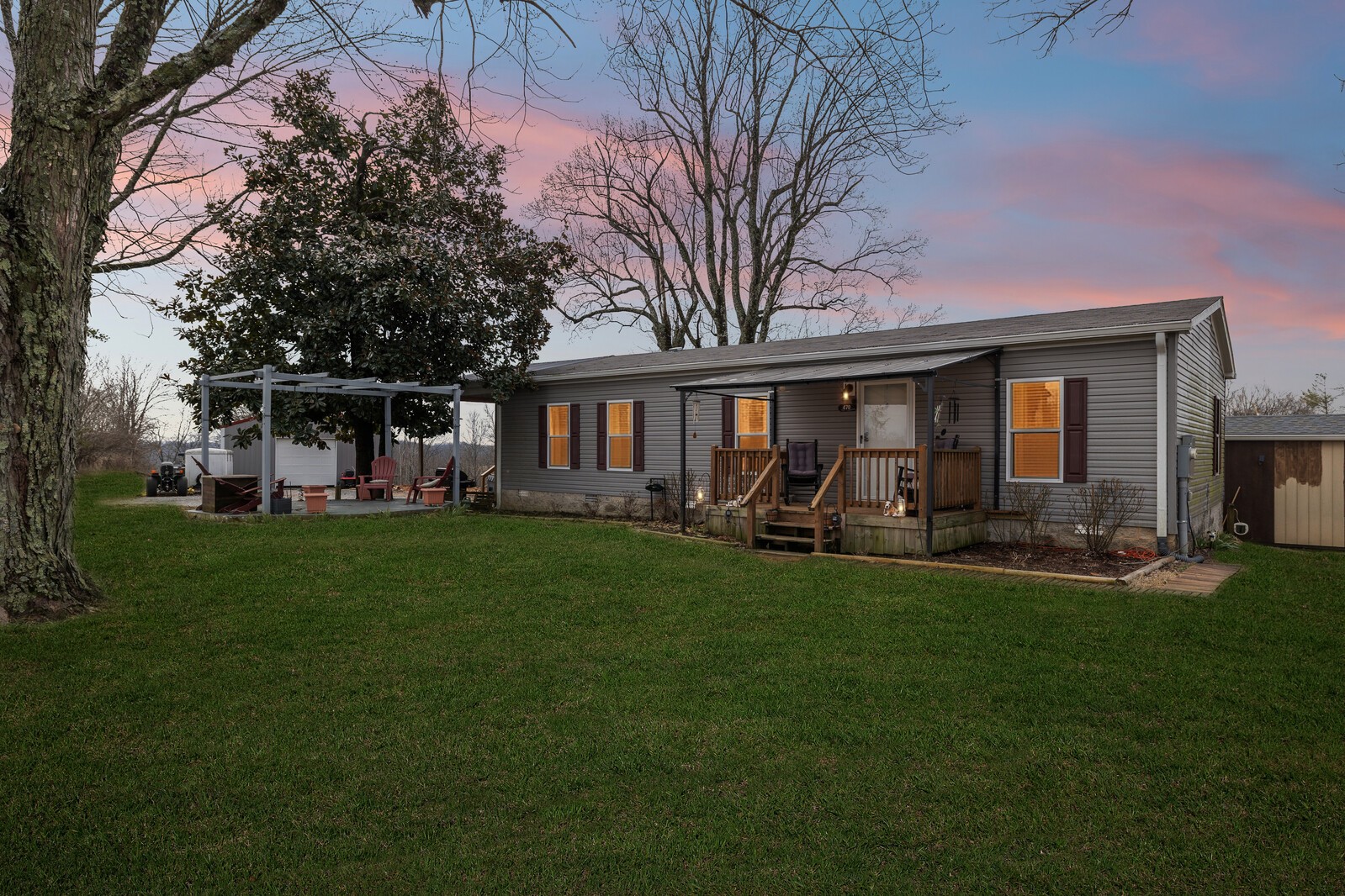 470 James Whitefield Road Bethpage, TN 37022 - Photo 2 of 22 a view of a house with backyard porch and sitting area