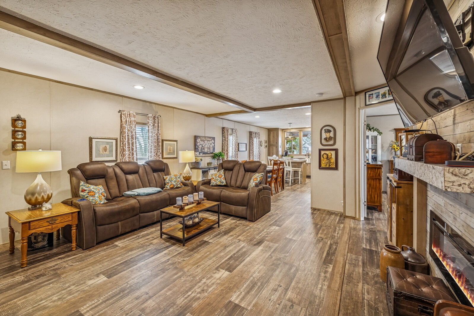 470 James Whitefield Road Bethpage, TN 37022 - Photo 5 of 22 a living room with furniture a flat screen tv and a wooden floor