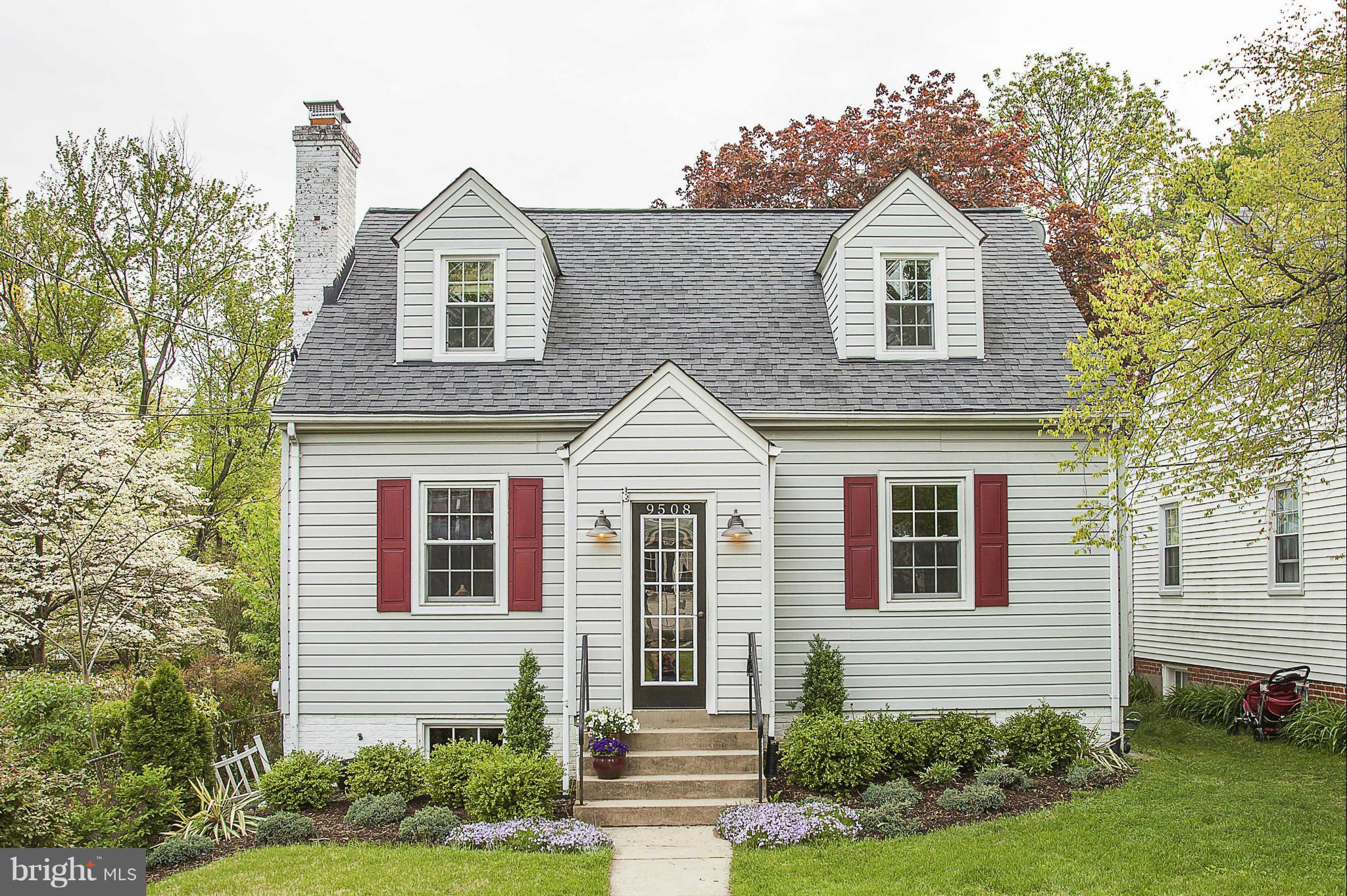 9508 Seminole Street Silver Spring, MD 20901 - Photo 1 of 28 a front view of a house with a yard