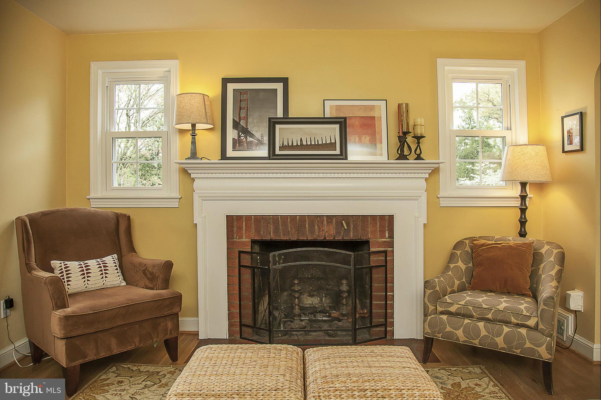 9508 Seminole Street Silver Spring, MD 20901 - Photo 3 of 28 a living room with furniture and a fireplace