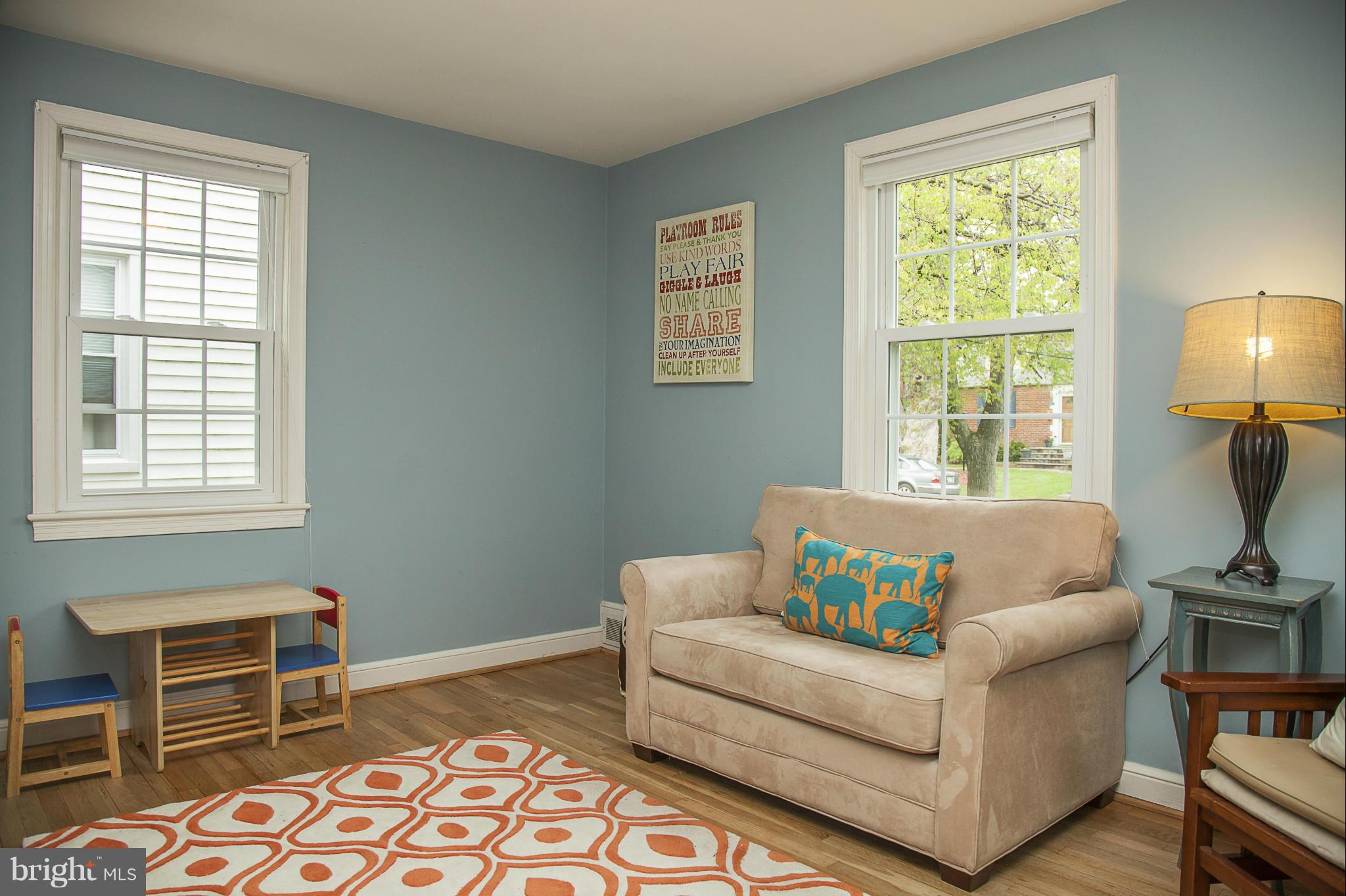 9508 Seminole Street Silver Spring, MD 20901 - Photo 10 of 28 a living room with furniture and a window