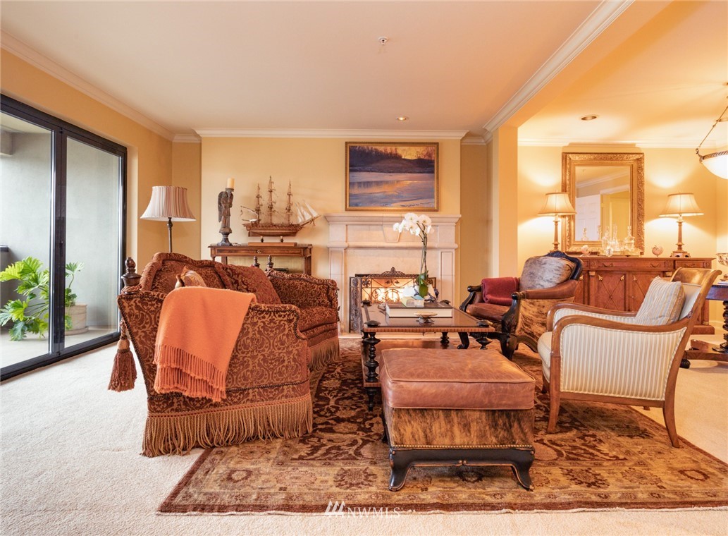 1331 Harbor Avenue Southwest, Unit 103 Seattle, WA 98116 - Photo 15 of 32 a living room with furniture and a window