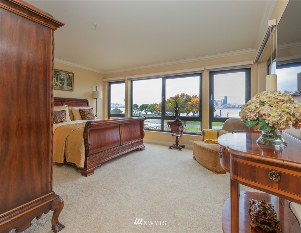 1331 Harbor Avenue Southwest, Unit 103 Seattle, WA 98116 - Photo 18 of 32 a bed room with a bed and a couch