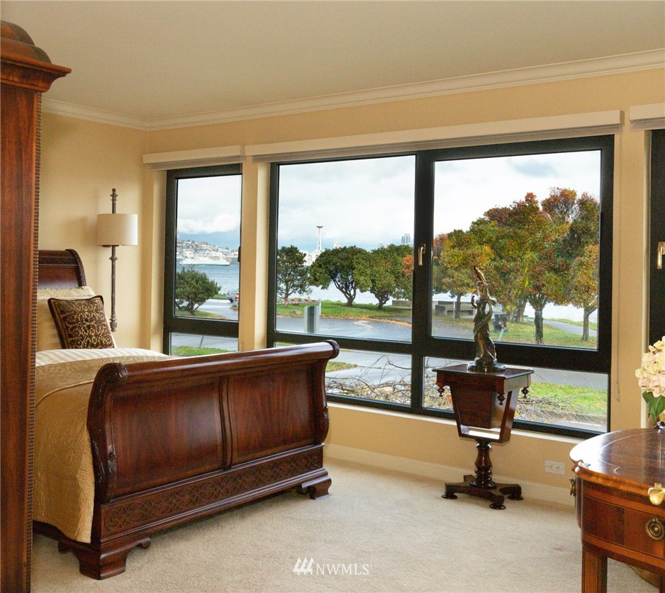 1331 Harbor Avenue Southwest, Unit 103 Seattle, WA 98116 - Photo 21 of 32 a living room with a large window and city view