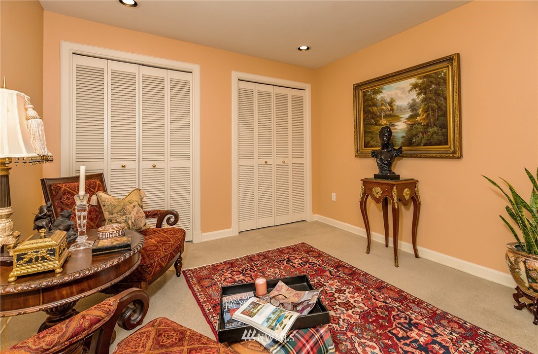1331 Harbor Avenue Southwest, Unit 103 Seattle, WA 98116 - Photo 29 of 32 a bedroom with furniture and a window