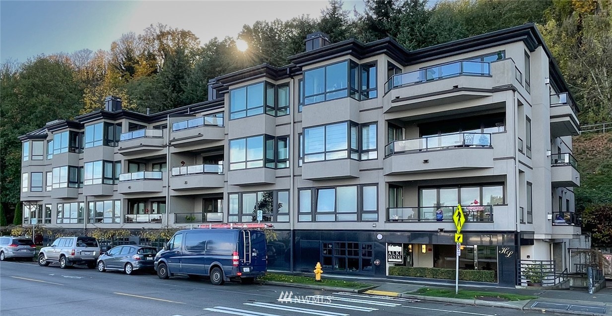 1331 Harbor Avenue Southwest, Unit 103 Seattle, WA 98116 - Photo 3 of 32 a view of building with car parked