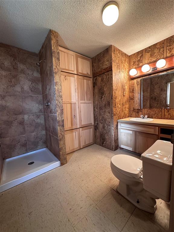 205 First Street Bangs, TX 76823 - Photo 8 of 16 a bathroom with a sink toilet and shower