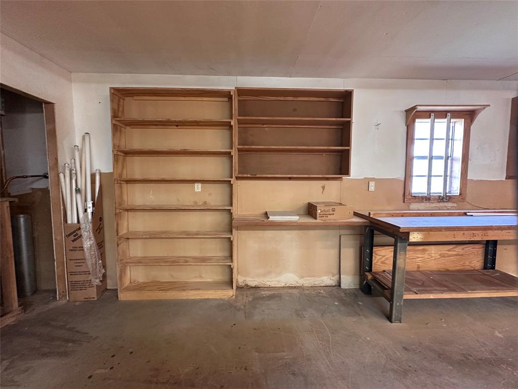 205 First Street Bangs, TX 76823 - Photo 9 of 16 a view of walk in closet with empty racks