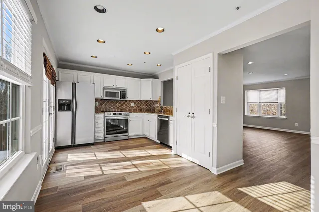 a view of kitchen with wooden floor