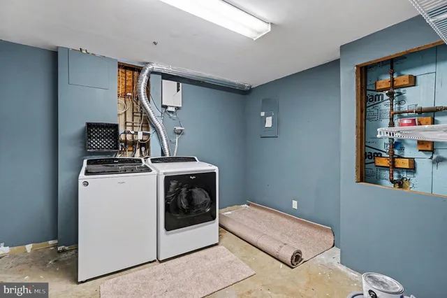 a storage room with washer and dryer