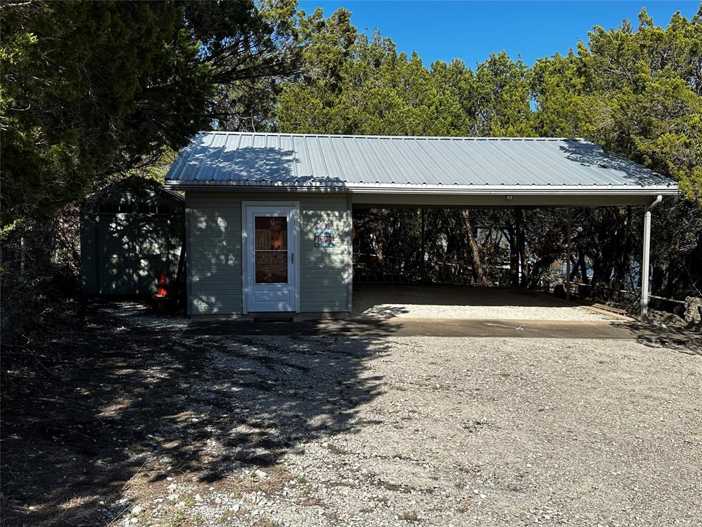 3725 Hazard Way Caddo, TX 76429 - Photo 7 of 40 Storage shed to the left, bunk house & Carport
