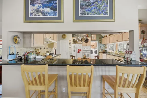 a view of a dining room with furniture