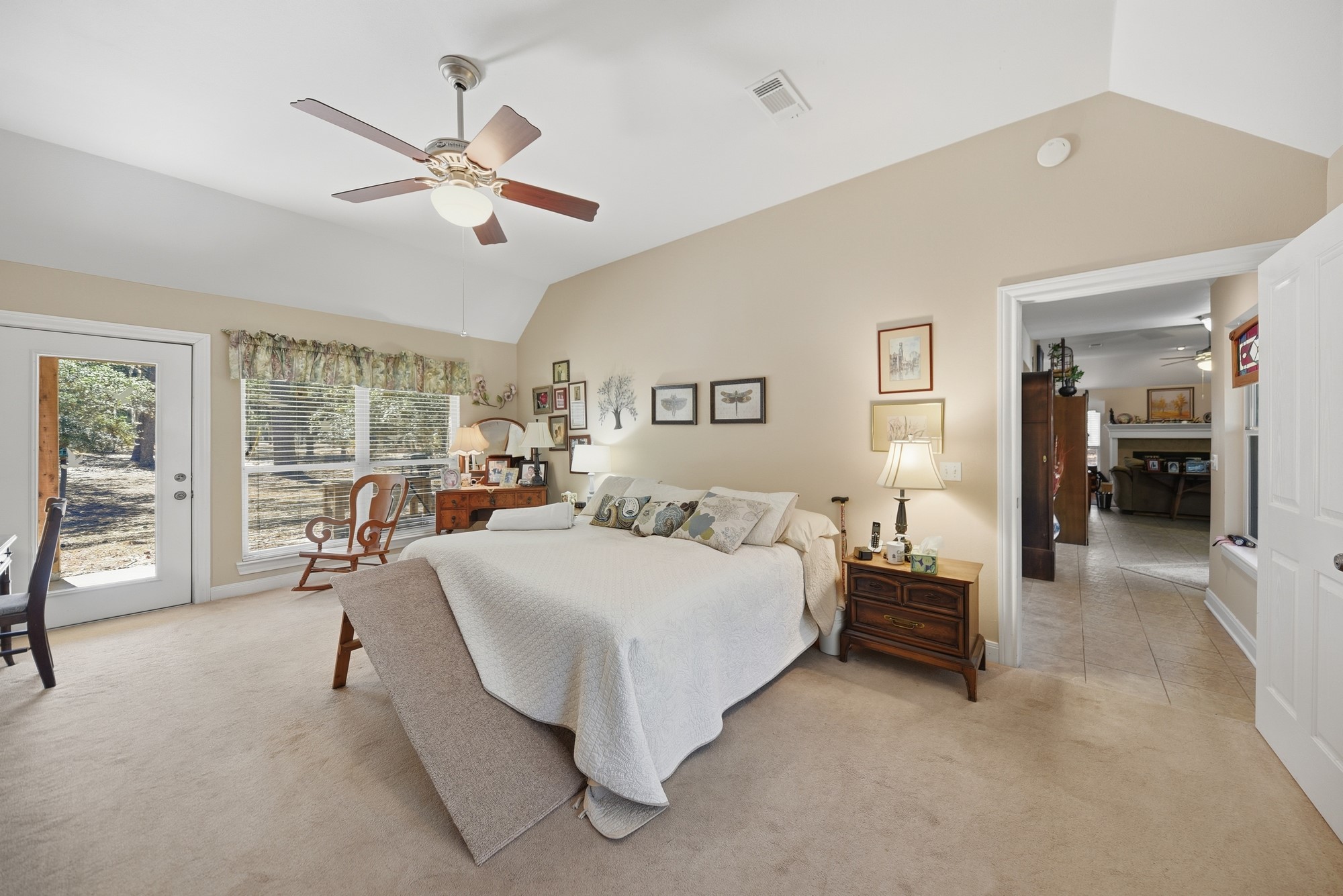 1298 Oil Patch Road New Ulm, TX 78950 - Photo 19 of 27 a spacious bedroom with a bed and large cabinets