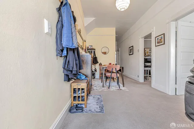 a bathroom with a toilet sink and shower