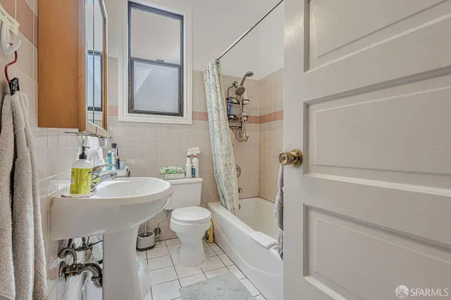 a view of a room with wooden walls