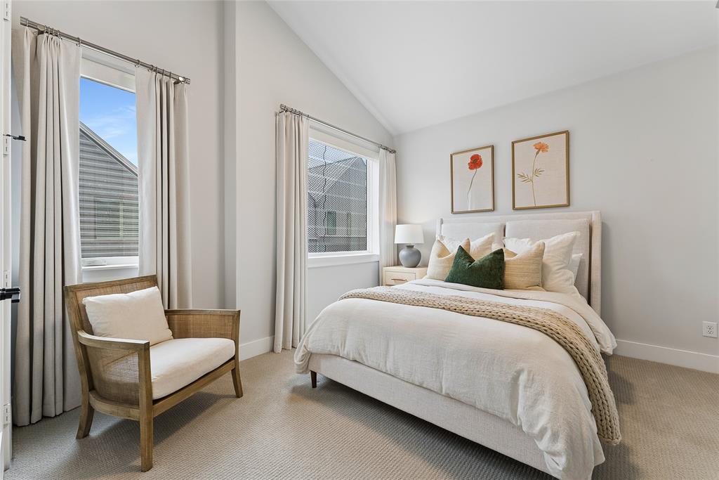 3922 Redding Row Dallas, TX 75220 - Photo 29 of 35 a bedroom with a bed and a couch next to a window