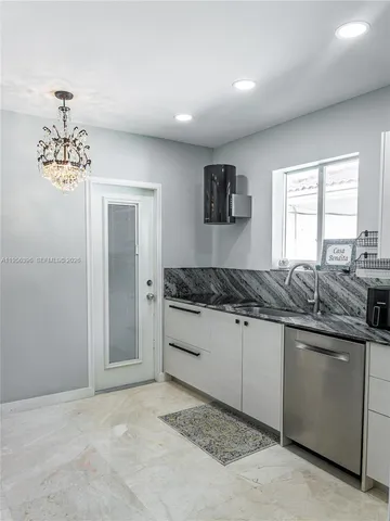 $1,950,000 | 9117 Carlyle Avenue, Surfside, FL 33154