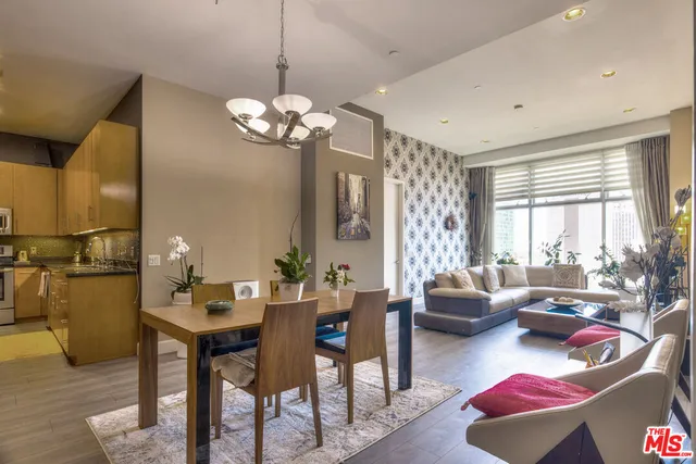 a view of a livingroom with furniture and window