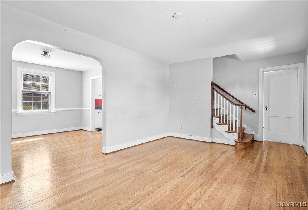 4521 Brook Road Richmond, VA 23227 - Photo 6 of 29 a view of an empty room with wooden floor and a window