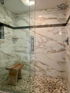 4650 Links Village Drive, Unit B503 Ponce Inlet, FL 32127 - Photo 28 of 47 a bathroom with a shower