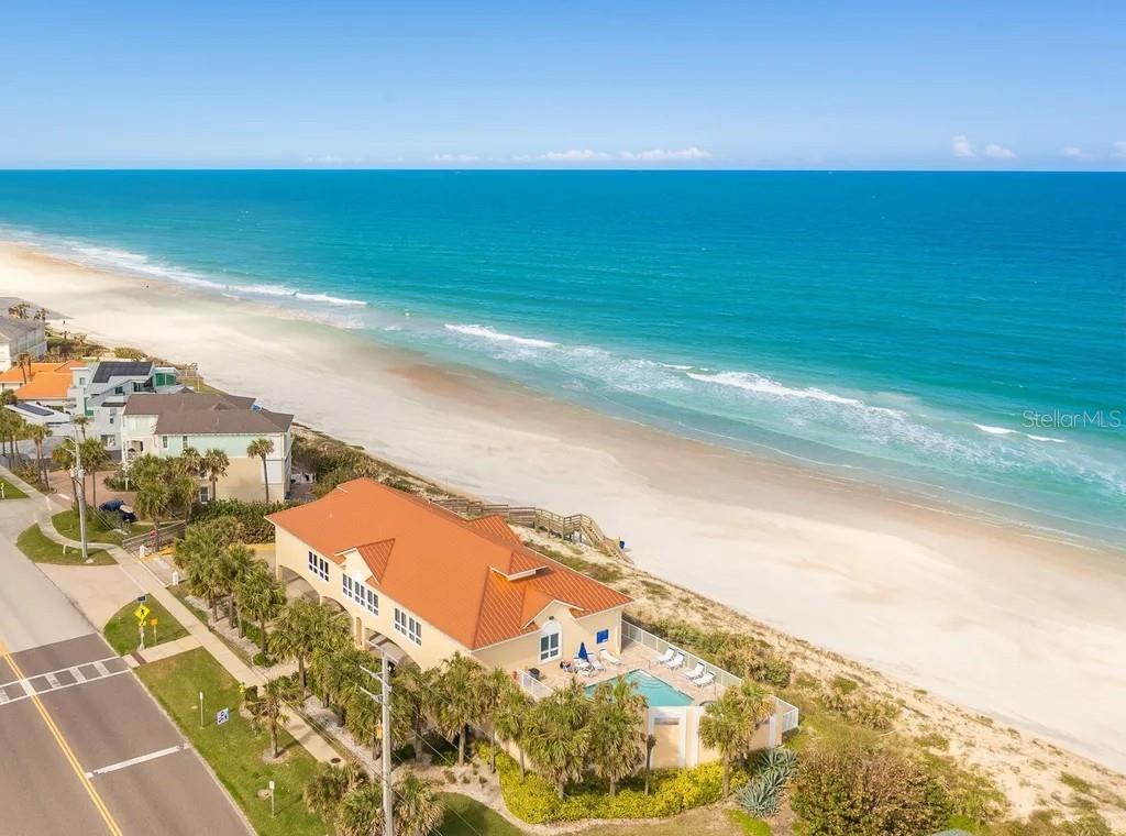 4650 Links Village Drive, Unit B503 Ponce Inlet, FL 32127 - Photo 46 of 47 a view of an ocean and beach