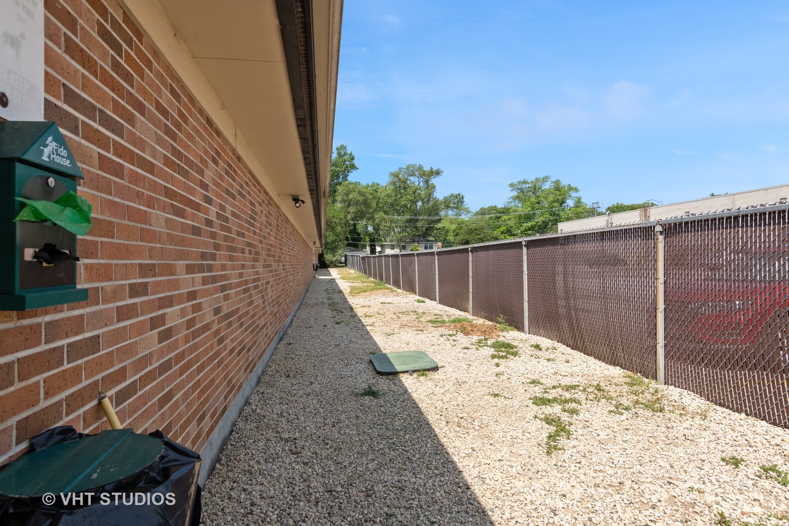 1107 South Old Wilke Road, Unit 205 Rolling Meadows, IL 60008 - Photo 18 of 19 a view of a backyard with pathway
