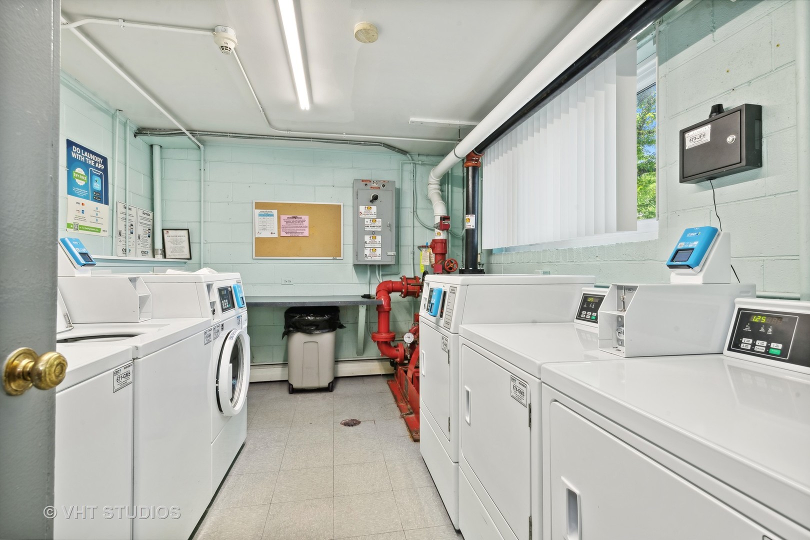 1107 South Old Wilke Road, Unit 205 Rolling Meadows, IL 60008 - Photo 19 of 19 a utility room with two washing machine