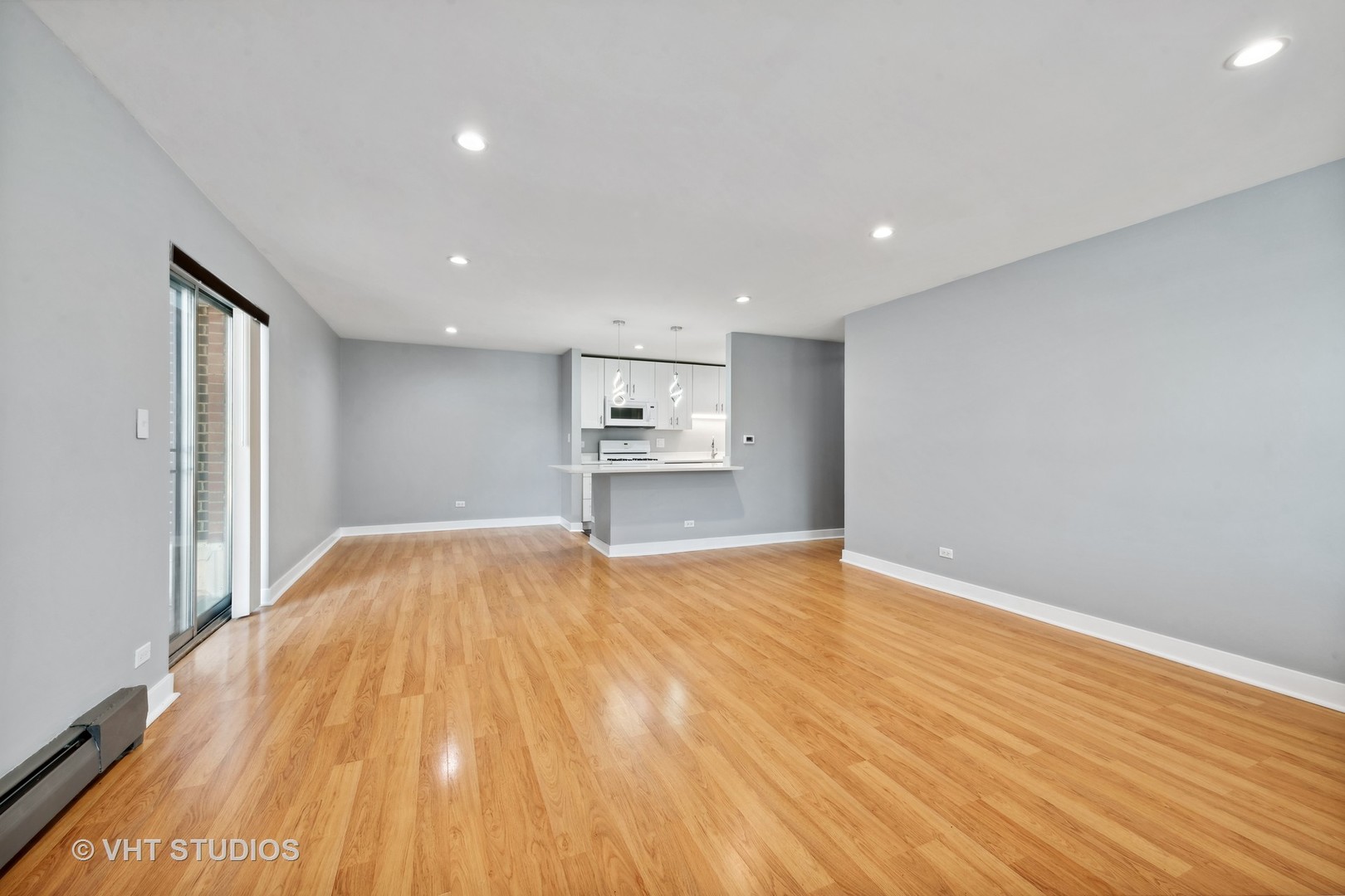 1107 South Old Wilke Road, Unit 205 Rolling Meadows, IL 60008 - Photo 8 of 19 a view of empty room with wooden floor