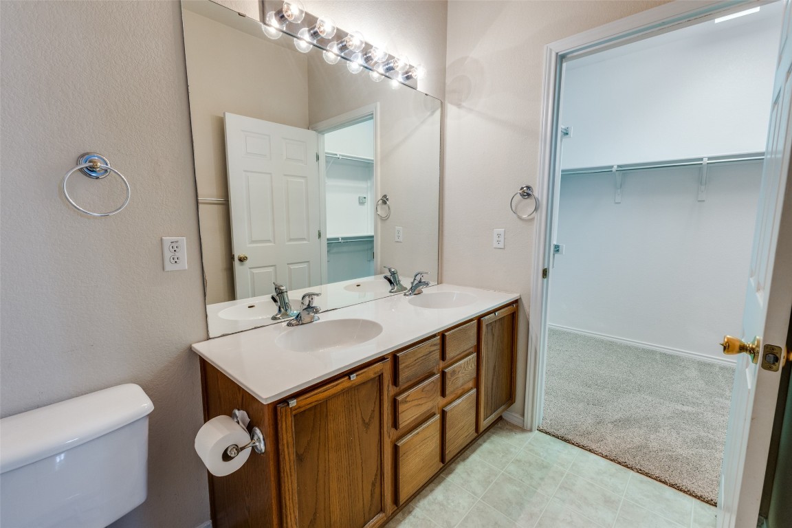 206 Bonham Loop Georgetown, TX 78633 - Photo 11 of 18 a bathroom with a sink and a mirror