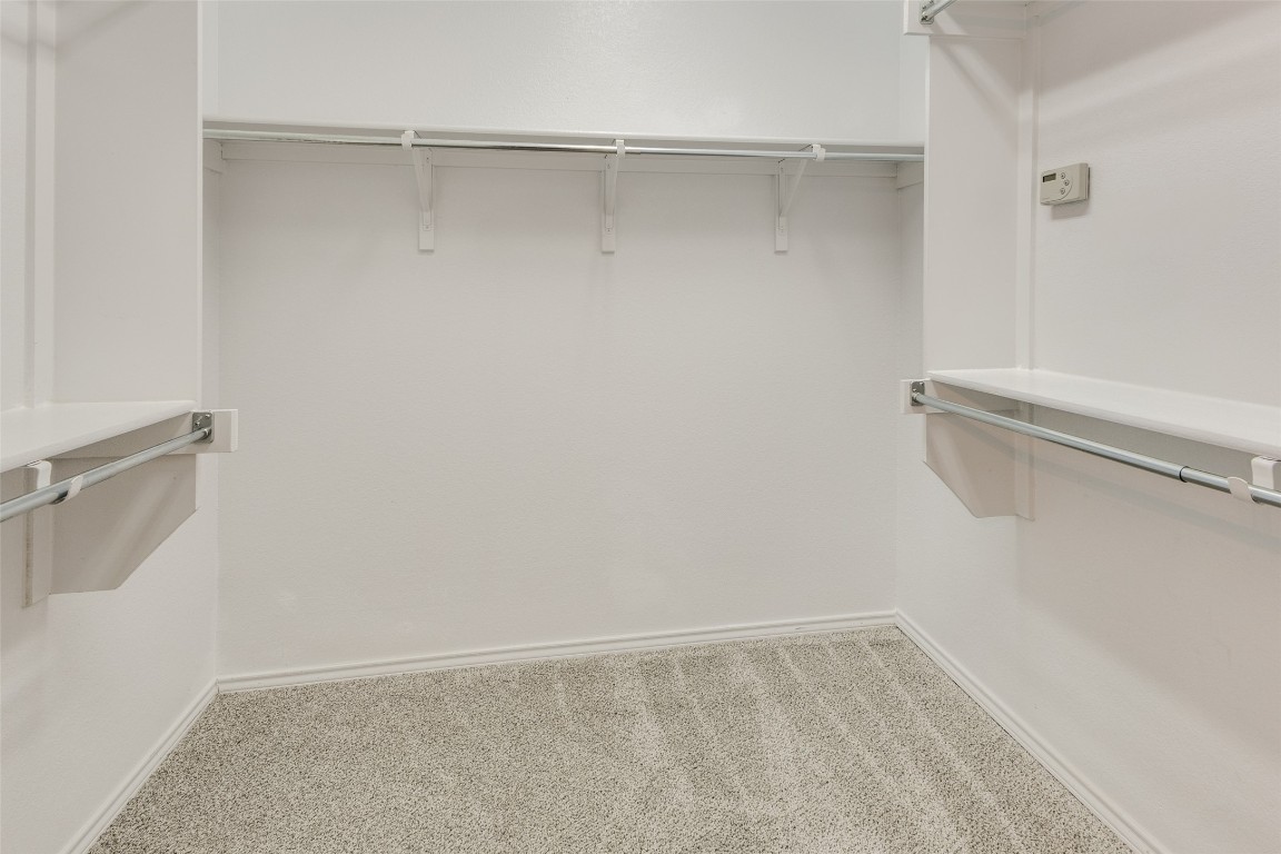 206 Bonham Loop Georgetown, TX 78633 - Photo 12 of 18 a view of an empty walk in closet