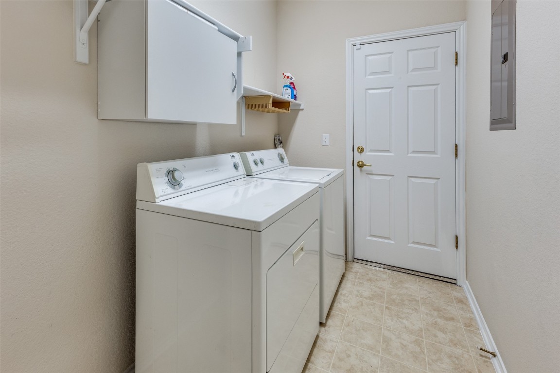 206 Bonham Loop Georgetown, TX 78633 - Photo 16 of 18 a utility room with a sink dryer and washer