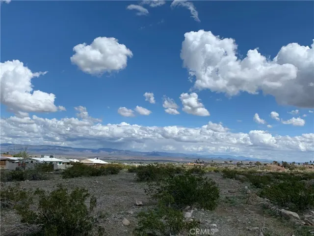 a view of a building in the back yard