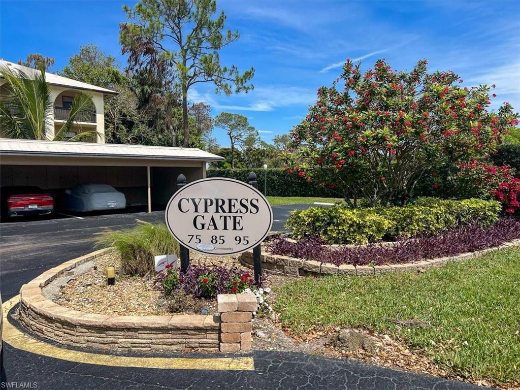 75 St Andrews Boulevard, Unit C301 Naples, FL 34113 - Photo 27 of 41 a view of outdoor space and garden