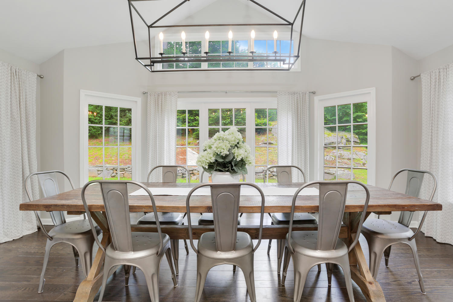 171 Jonathan Road New Canaan, CT 06840 - Photo 15 of 38 a view of a dining room with furniture window and outside view