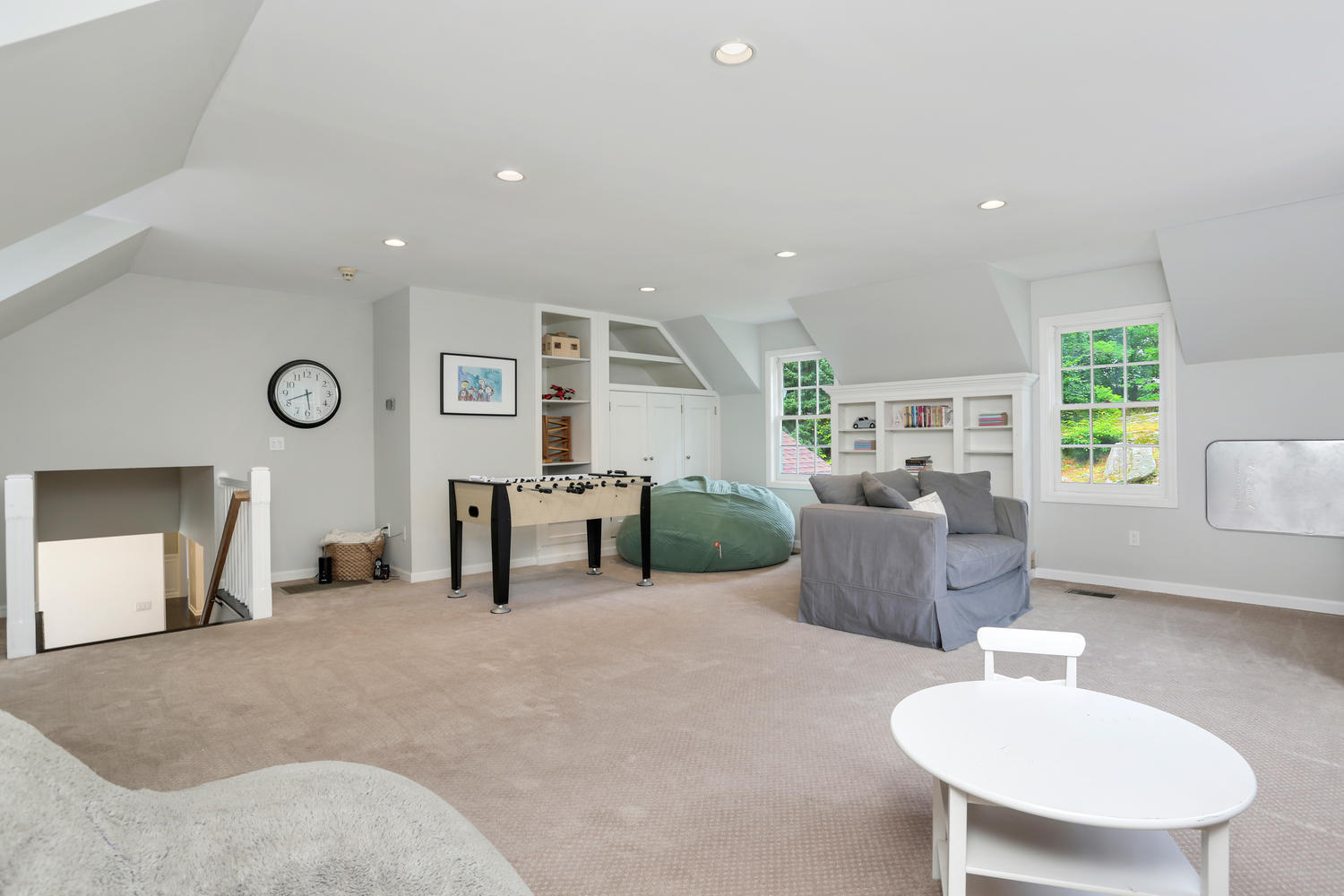 171 Jonathan Road New Canaan, CT 06840 - Photo 18 of 38 a living room with furniture and a table