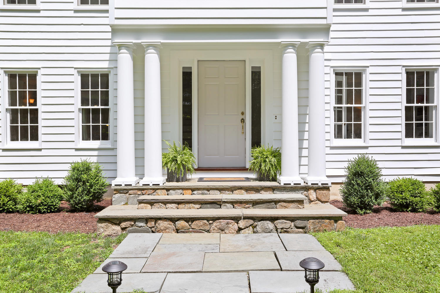 171 Jonathan Road New Canaan, CT 06840 - Photo 2 of 38 a view of a house with yard and sitting area