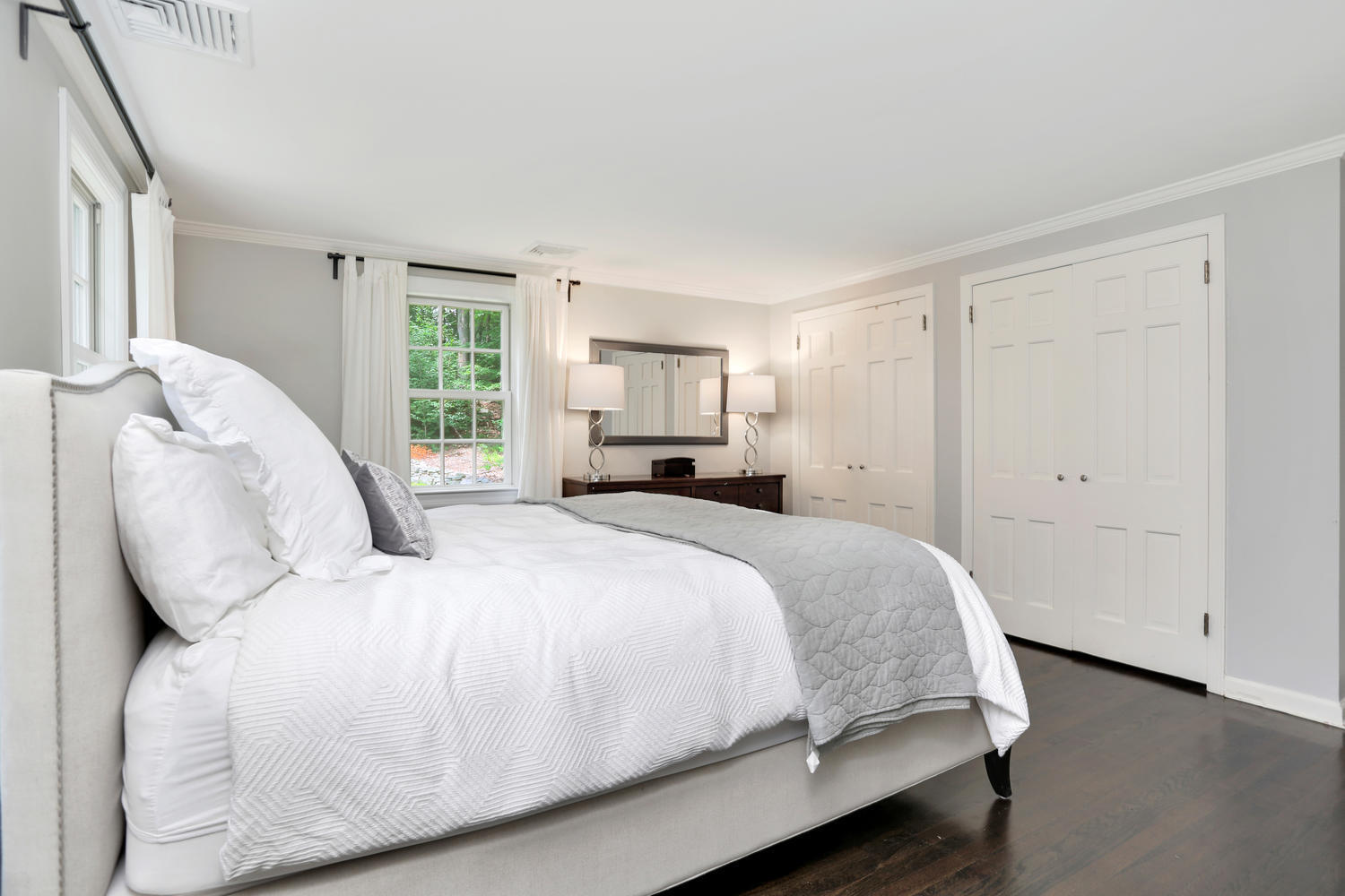 171 Jonathan Road New Canaan, CT 06840 - Photo 23 of 38 a bedroom with a bed and window